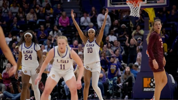Nov 30, 2023; Baton Rouge, Louisiana, USA; LSU Lady Tigers forward Angel Reese (10) pumps up the crowd during the first half against the Virginia Tech Hokies at Pete Maravich Assembly Center.